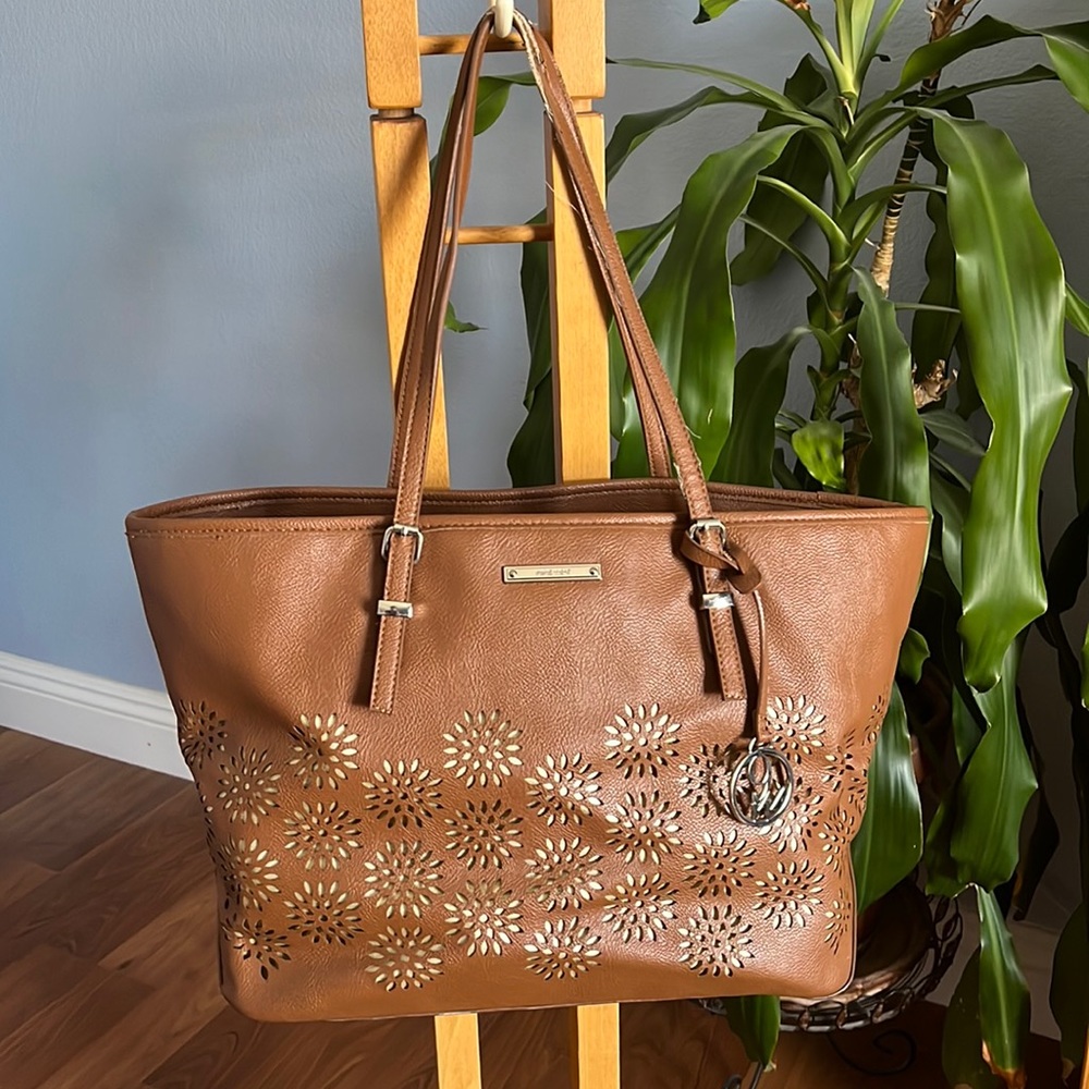 Nine West Duffel Shoulder Purse Brown Zip Top with Laser Cut Flowers.